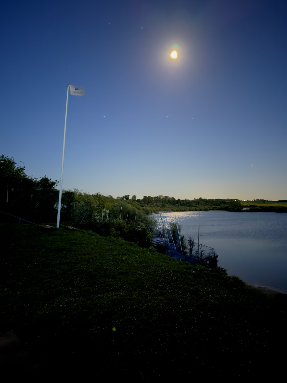 Scouts gathered outside at twilight